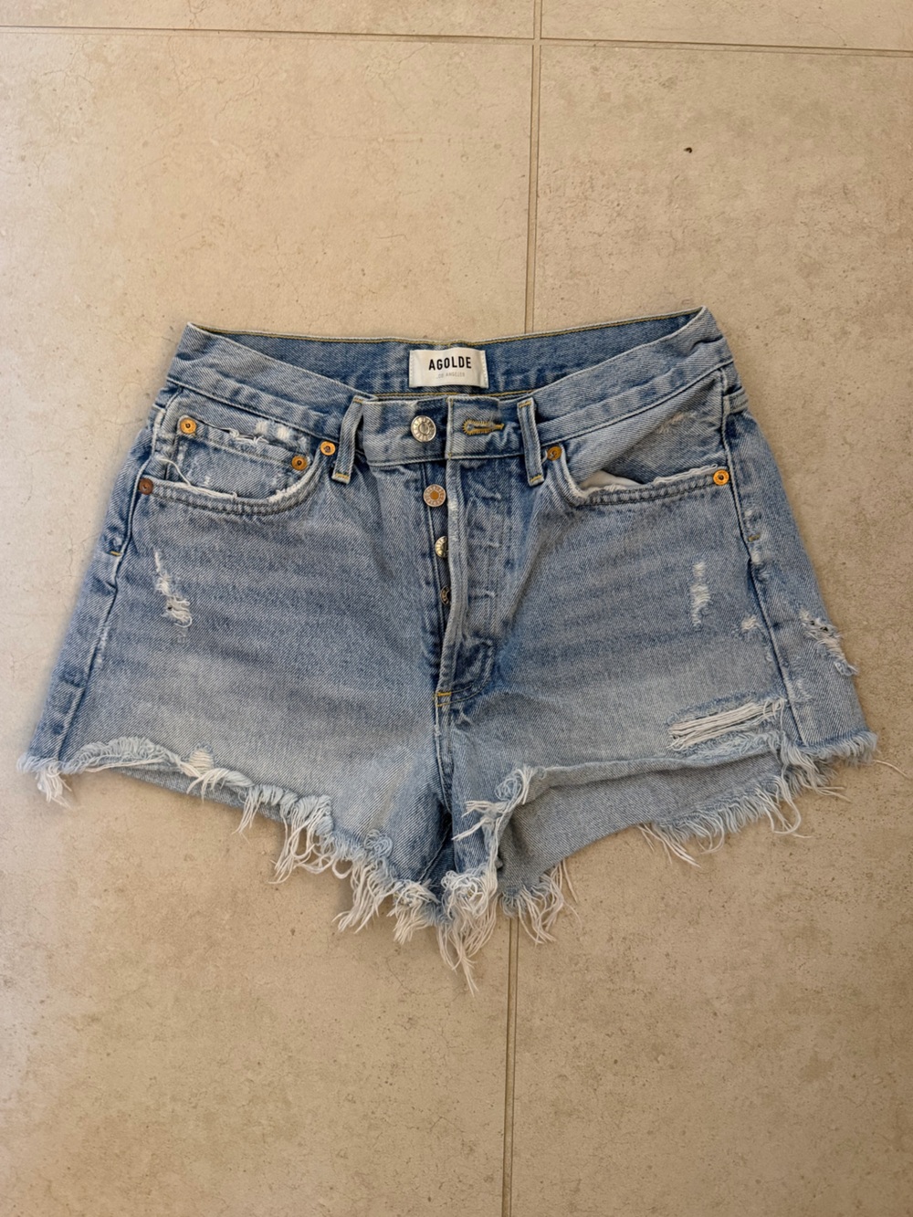 Agolde Light Blue Distressed Denim Cutoff Shorts